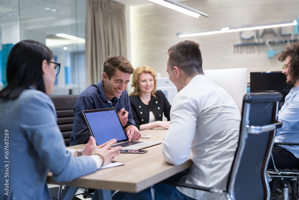 Startup Business Team At A Meeting at modern office building