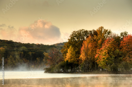 foggy fall morning at lake