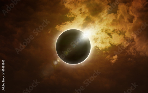 Total solar eclipse in dark glowing sky
