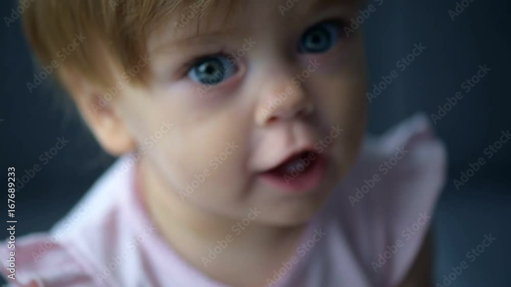 Portrait of a nice toddler sitting on the couch Portrait of a nice toddler sitting on the couch