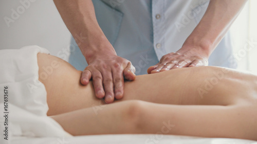 Massage parlor. Male hand close-up