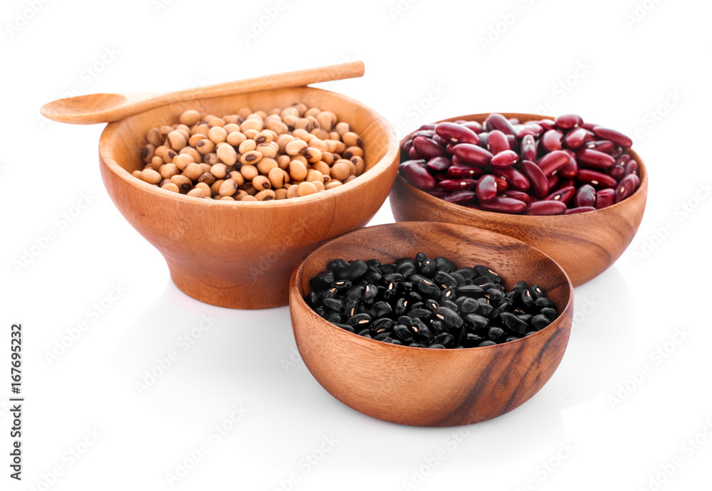 Black beans, red beans, soybeans in wooden bowl on white background Black beans, red beans, soybeans in wooden bowl on white background