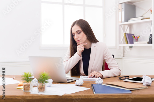 Business woman working on laptop at office