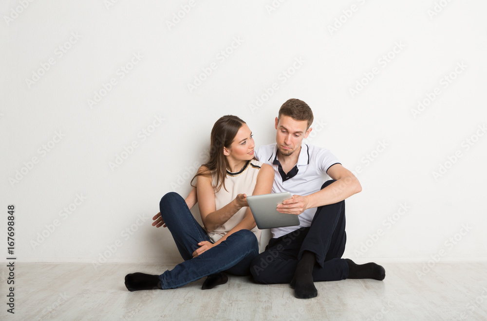 Couple shopping online with digital tablet Couple shopping online with digital tablet