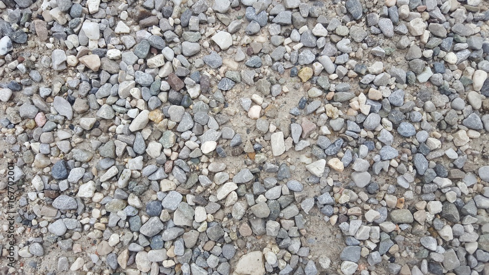 Close up of pebbles on a gravel pathway. Close up of pebbles on a gravel pathway.