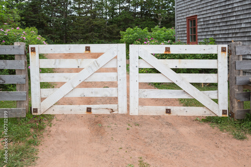 White gates on a farm in the country