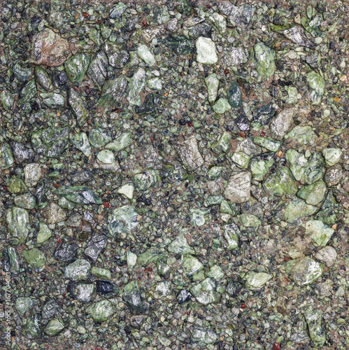 Tile from small green stones, stone pavement