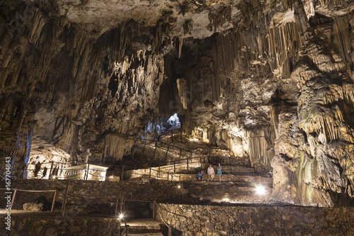 Melidoni cave with stalactites and stalagmites on the island of Crete, Greece photo