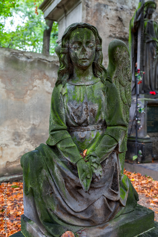Staue on old cemetery in Prague.