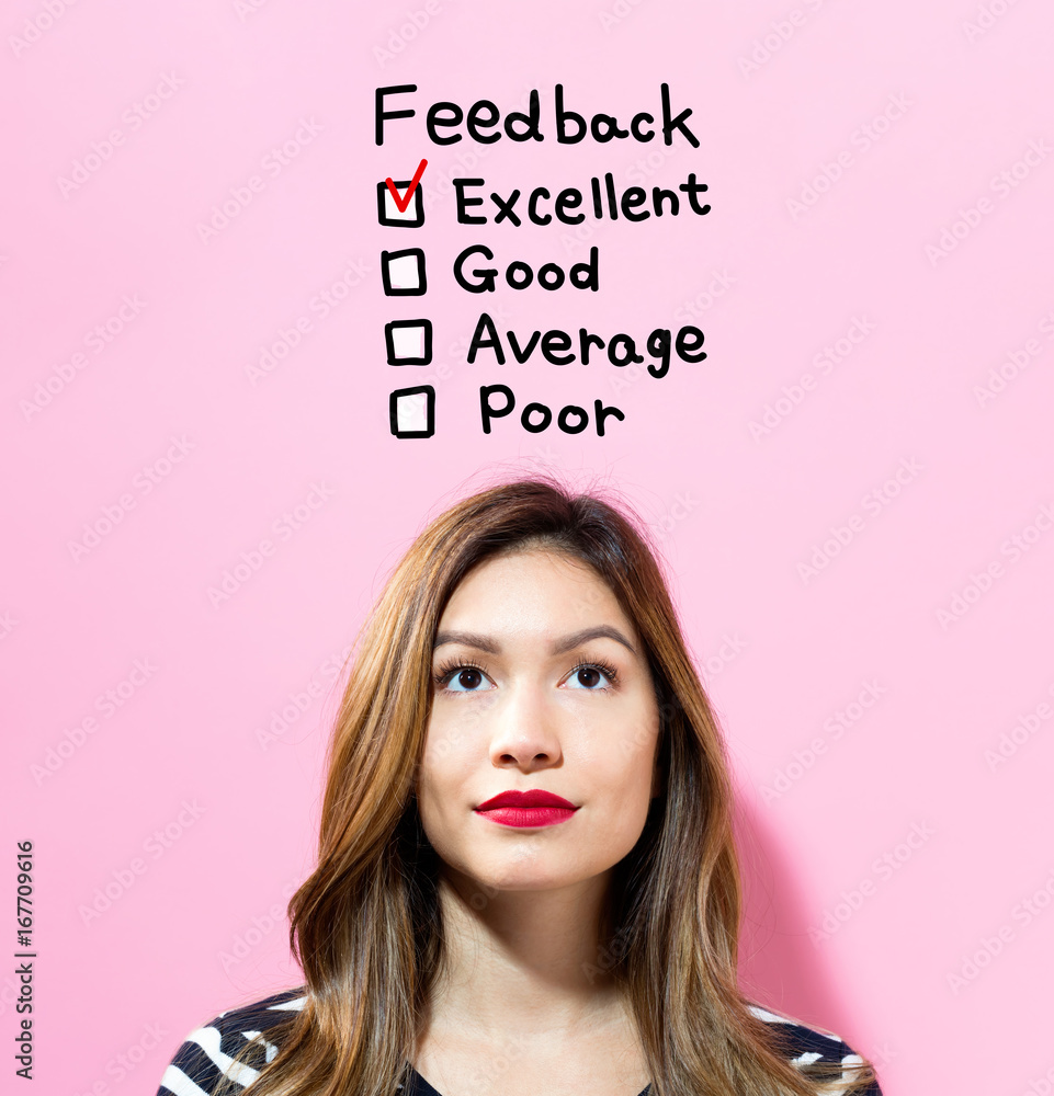 Feedback text with young woman on a pink background Feedback text with young woman on a pink background