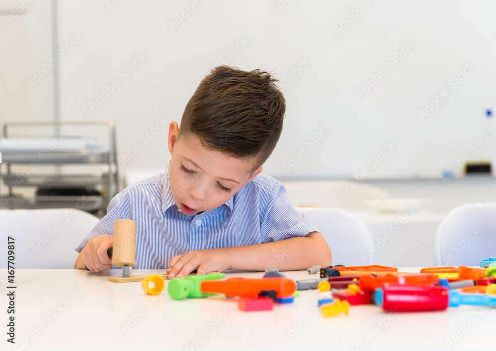 one child boy play repair toys, with hummer one child boy play repair toys, with hummer