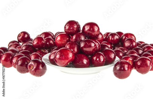 Many berries of fresh cherries on the white background