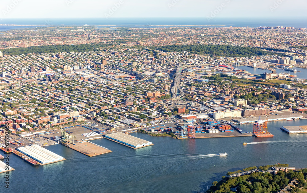 Fototapeta premium Aerial view of Brooklyn New York City with East river in the foreground