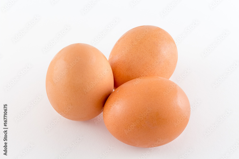 Group of brown raw eggs, isolated on white Background Group of brown raw eggs, isolated on white Background