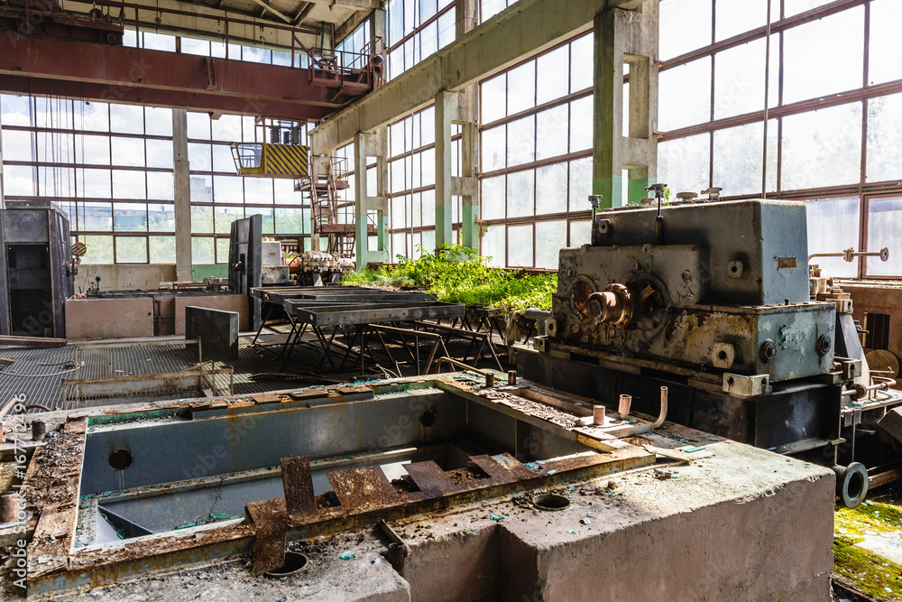 Abandoned and destroyed by war overgrown factory