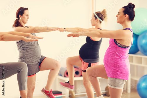 Group of pregnant women during fitness class