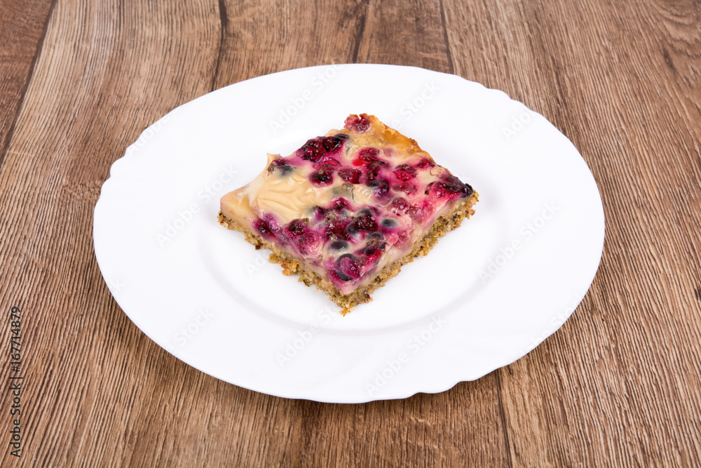 Vegetarian food on a plate with wooden background Vegetarian food on a plate with wooden background