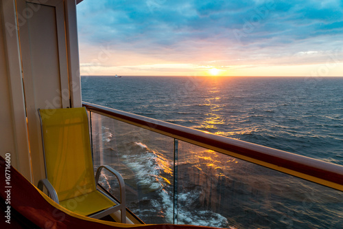 balcony on a cruise ship - sunset over the ocean or baltic sea