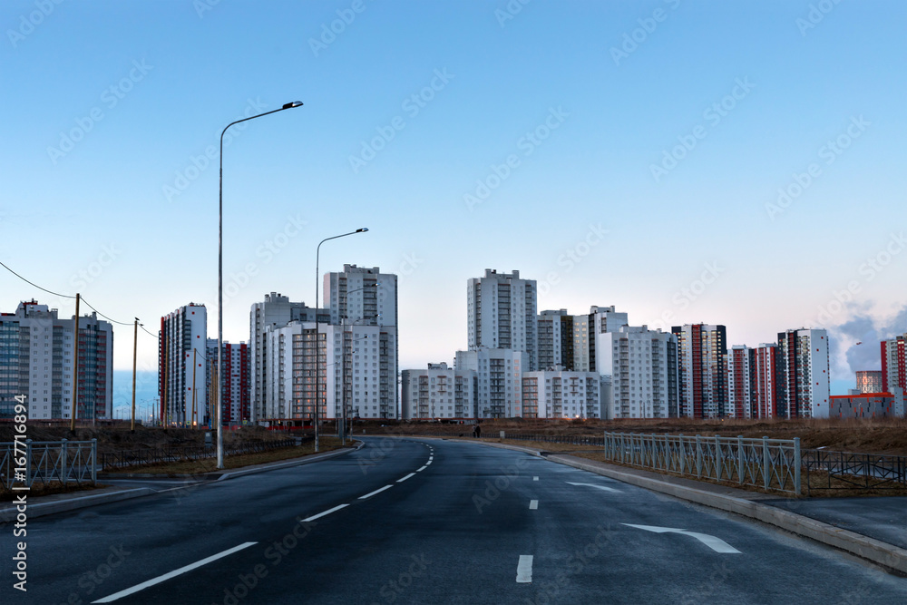 Modern cityscape, new building for people living on the sunset