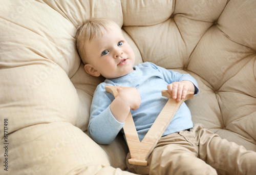 Cute little boy with letter...