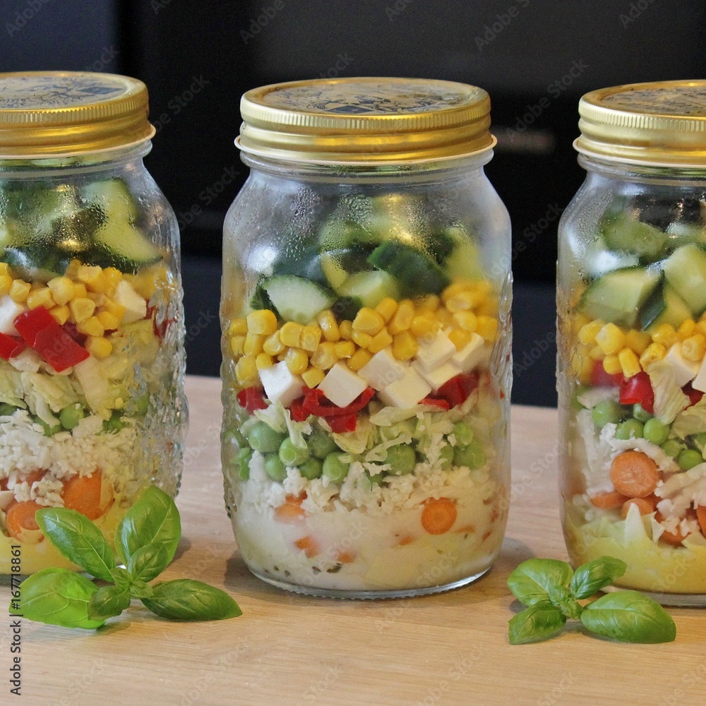 Glass jars with salad ready to go Glass jars with salad ready to go