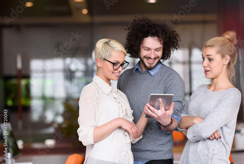 group of Business People Working With Tablet in startup office