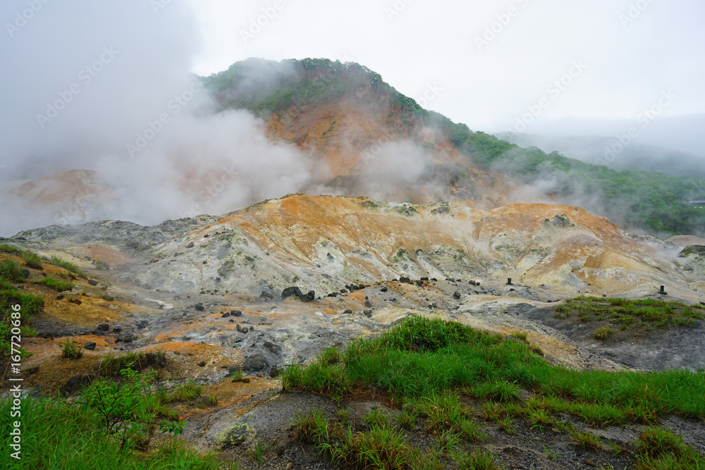 Active geothermic fumes in the onsen hot springs resort of Noboribetsu in the Shikotsu-Toya National Park in Hokkaido, Japan
