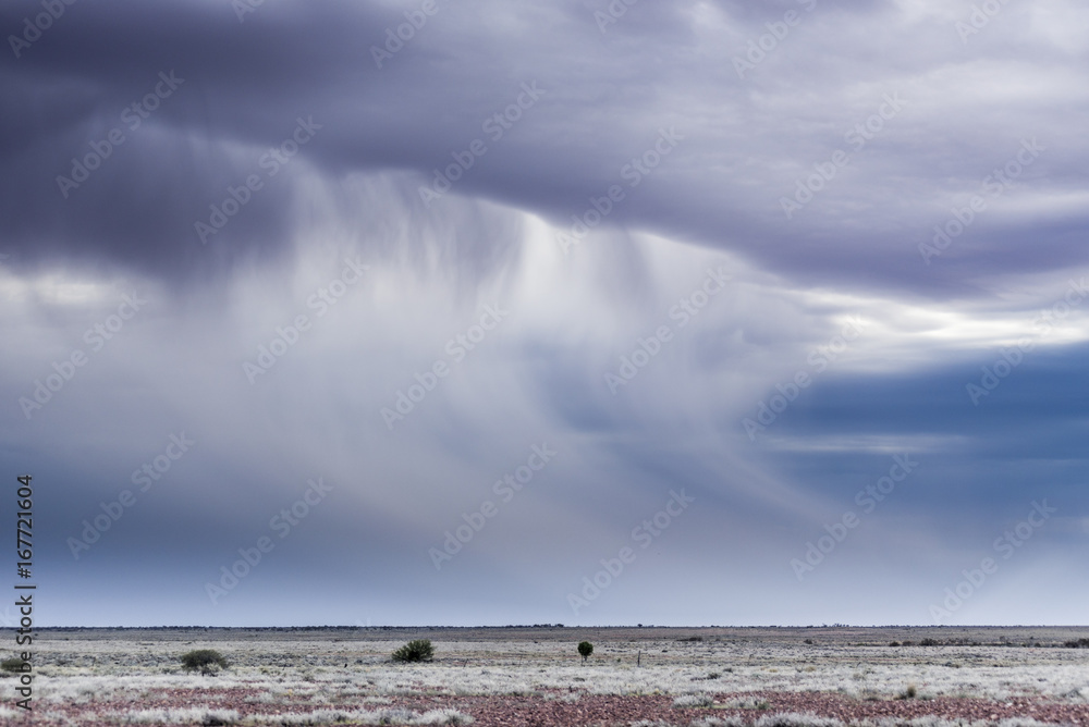 Obraz premium Dramatic Cloud Formation in Australia's desert - Bush