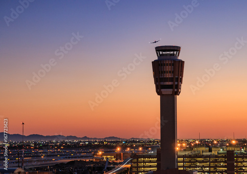 downtown Phoenix, Arizona skyline with famous camelback mountain at sunset