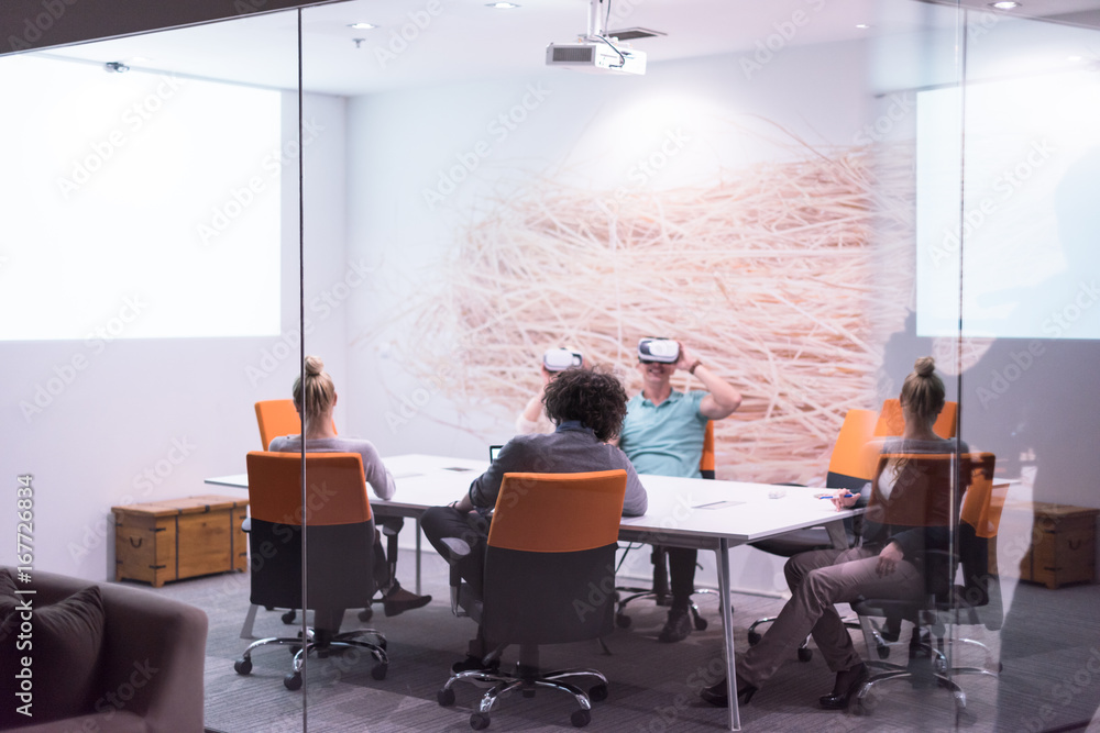 startup business team using virtual reality headset startup business team using virtual reality headset
