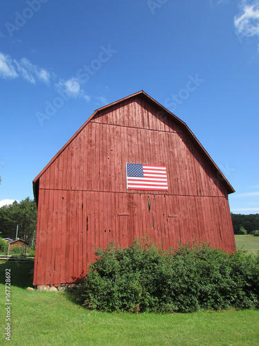 Red barn with American flag in Glen Arbor, Michigan near Sleeping Bear Dunes National Park
