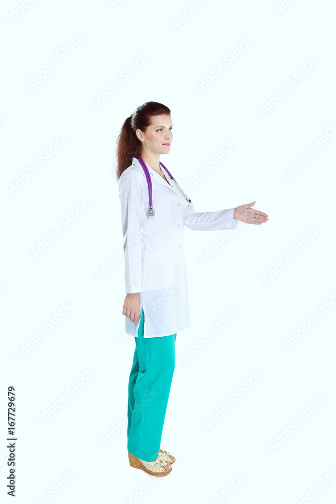 Smiling female doctor with a folder in uniform standing at hospital Smiling female doctor with a folder in uniform standing at hospital