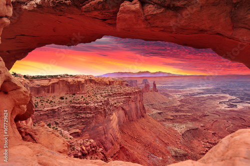 Colorful sunrise in Mesa Arch, Canyonlands National Park near Moab, Utah, USA