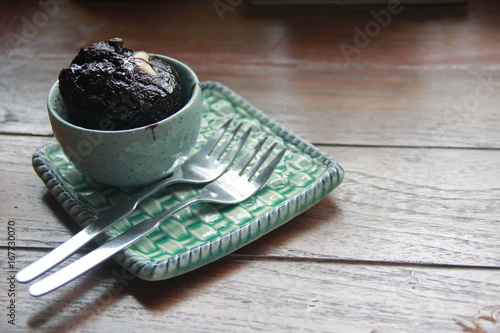 A cup of coffee with sweet chocolate brownie