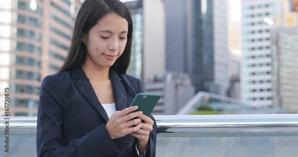 Business woman using mobile phone at outdoor Business woman using mobile phone at outdoor