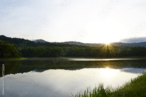 Landscapes of mountains and lake with sunrise in the morning