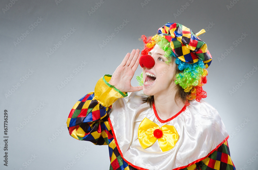 Funny clown in comical concept Funny clown in comical concept