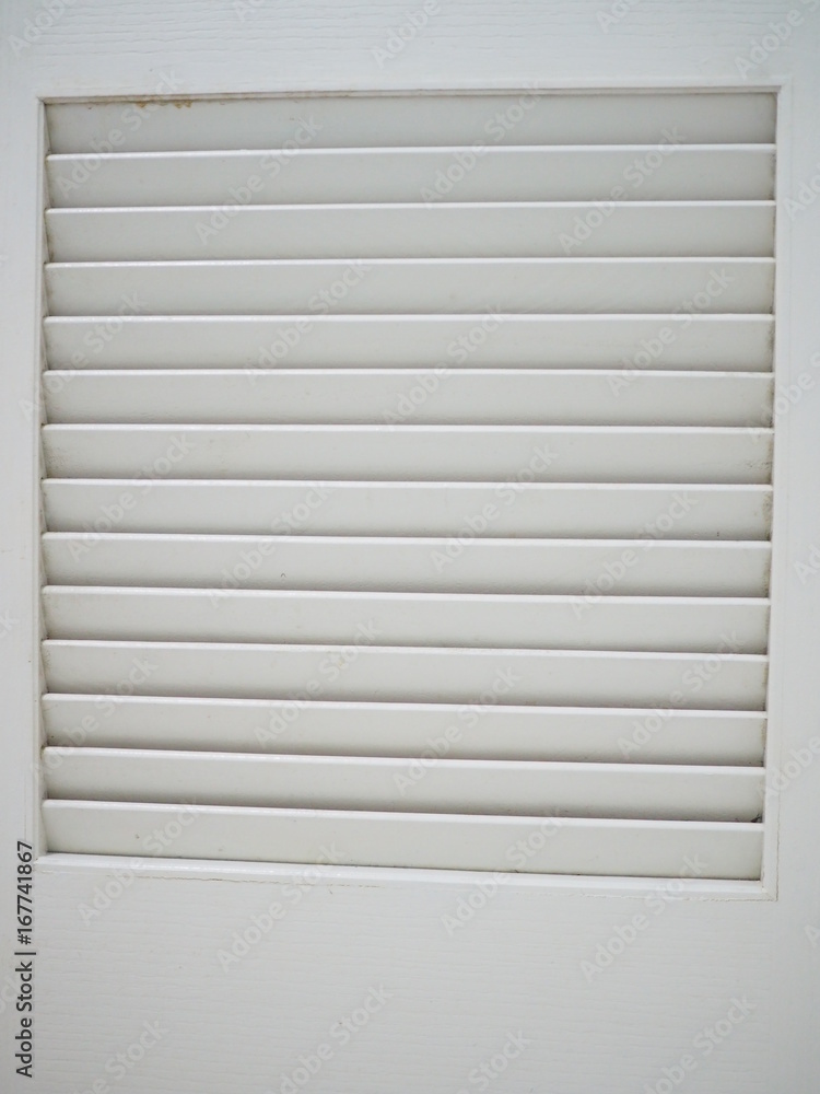 White dirty plastic louver with border White dirty plastic louver with border