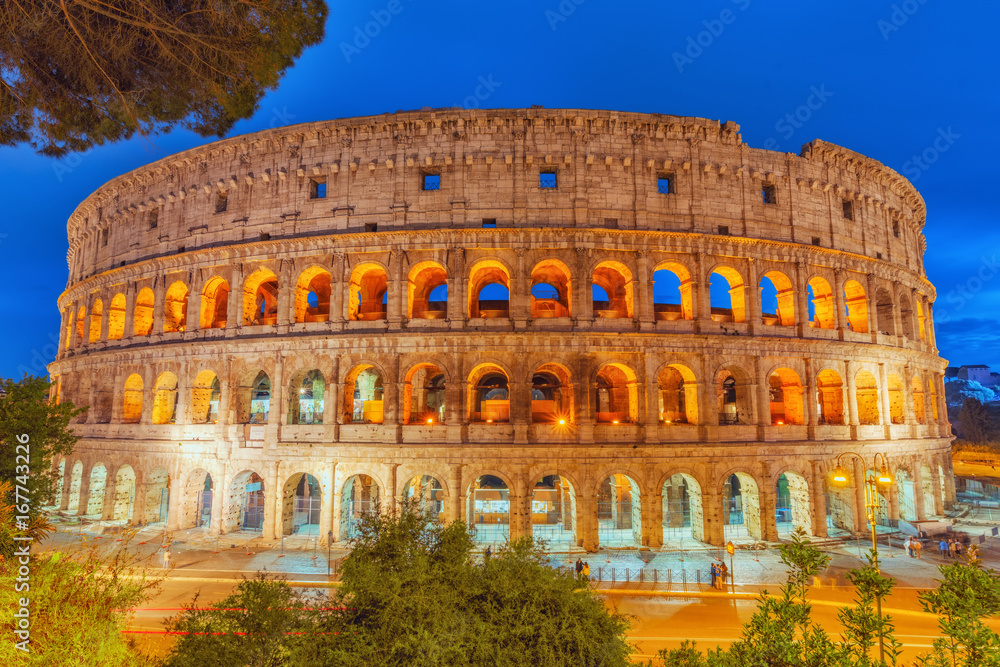 Beautiful landscape of the Colosseum in Rome- one of wonders of the world  in the evening time. Italy.