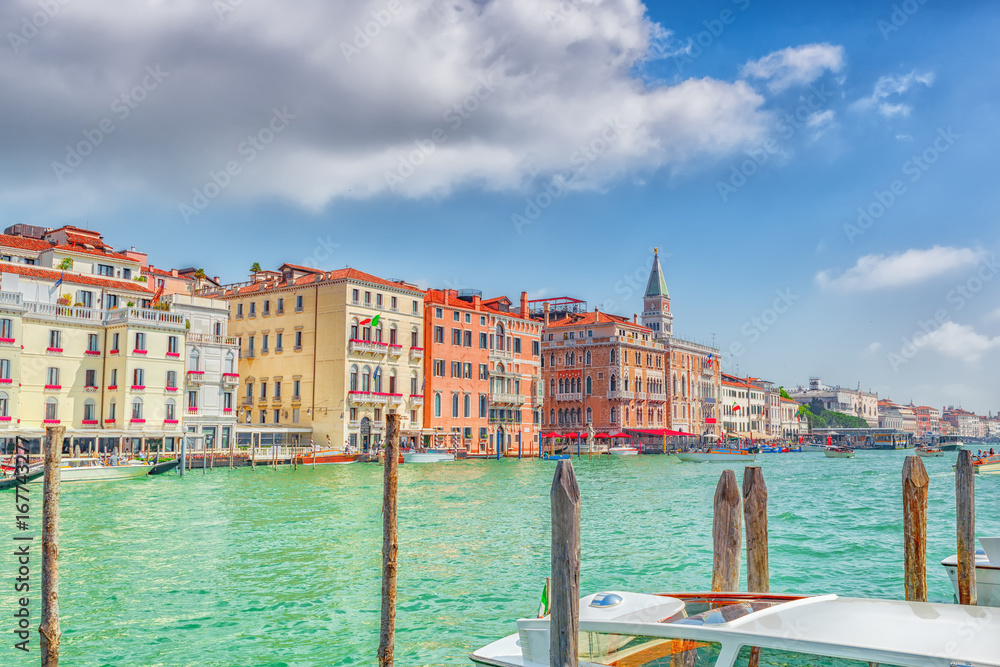 Views of the most beautiful canal of Venice - Grand Canal water streets, and Campanile of St. Mark's Cathedral (Campanile di San Marco). Italy.