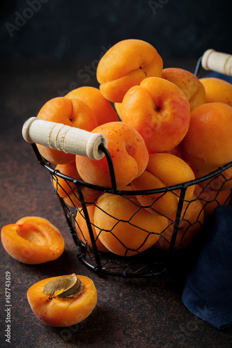 Delicious ripe apricots on a dark background. Selective focus.  copy space.