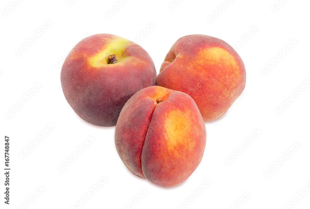 Three peaches on a white background