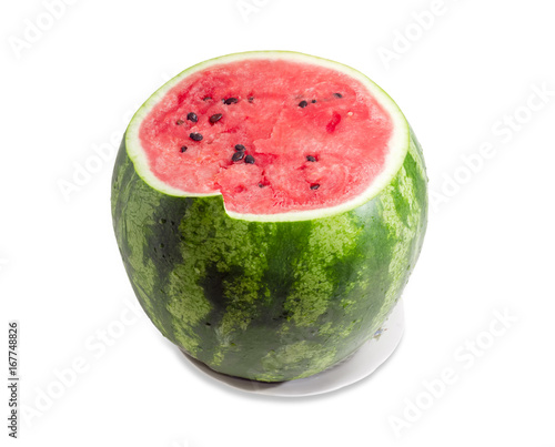 Partially incised watermelon on a white background