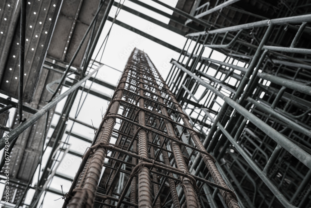 Using steel wire for securing steel bars with wire rod for reinforcement of concrete or cement. focus to steel wire Using steel wire for securing steel bars with wire rod for reinforcement of concrete or cement. focus to steel wire