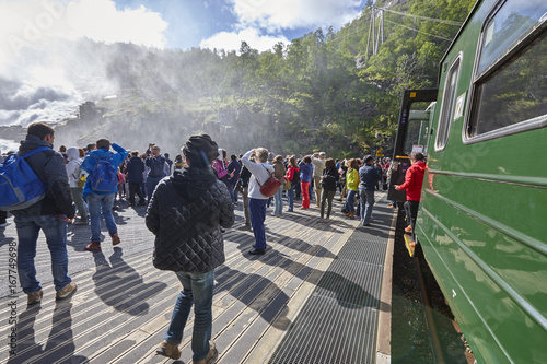 Flam train. Kjosfossen waterfall. Norwegian tourism highlight. photo