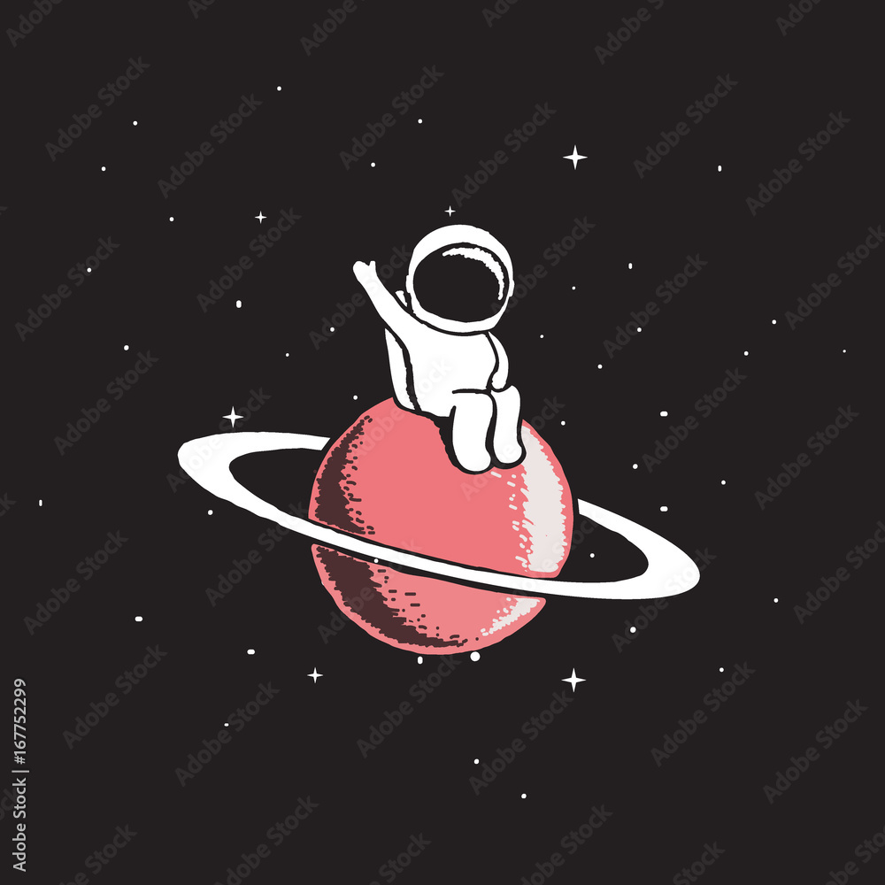 Fototapeta Baby astronaut sits on Saturn