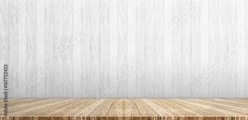 Wood plank table top at white painted wooden wall background,Mock up for display or montage of product,Banner or header for advertise on social media