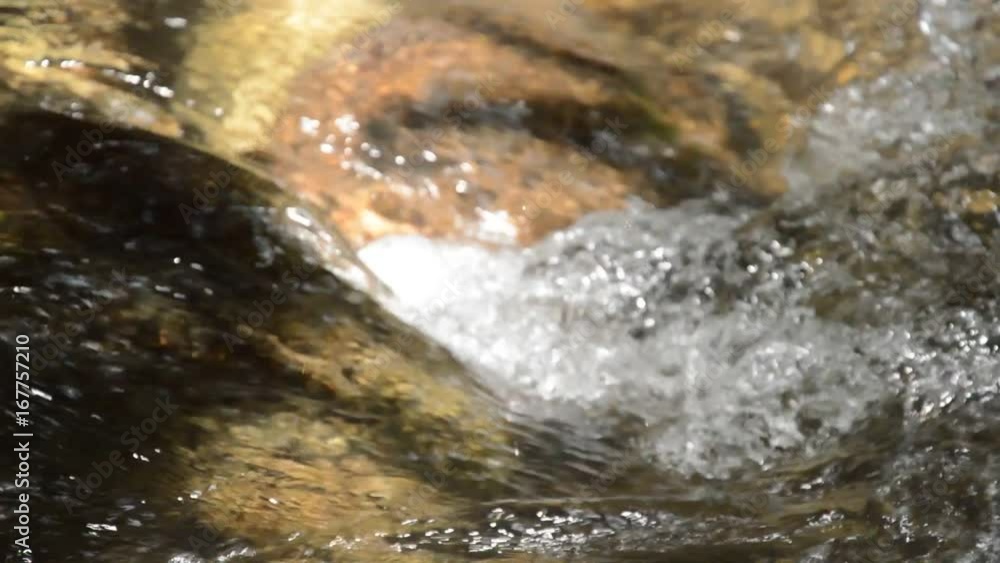 wide angle of water flowing and zoom in to wave splashing texture in river wide angle of water flowing and zoom in to wave splashing texture in river