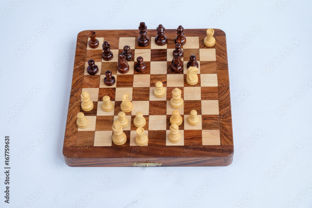 Chessboard with figures in progress isolated Chessboard with figures in progress isolated