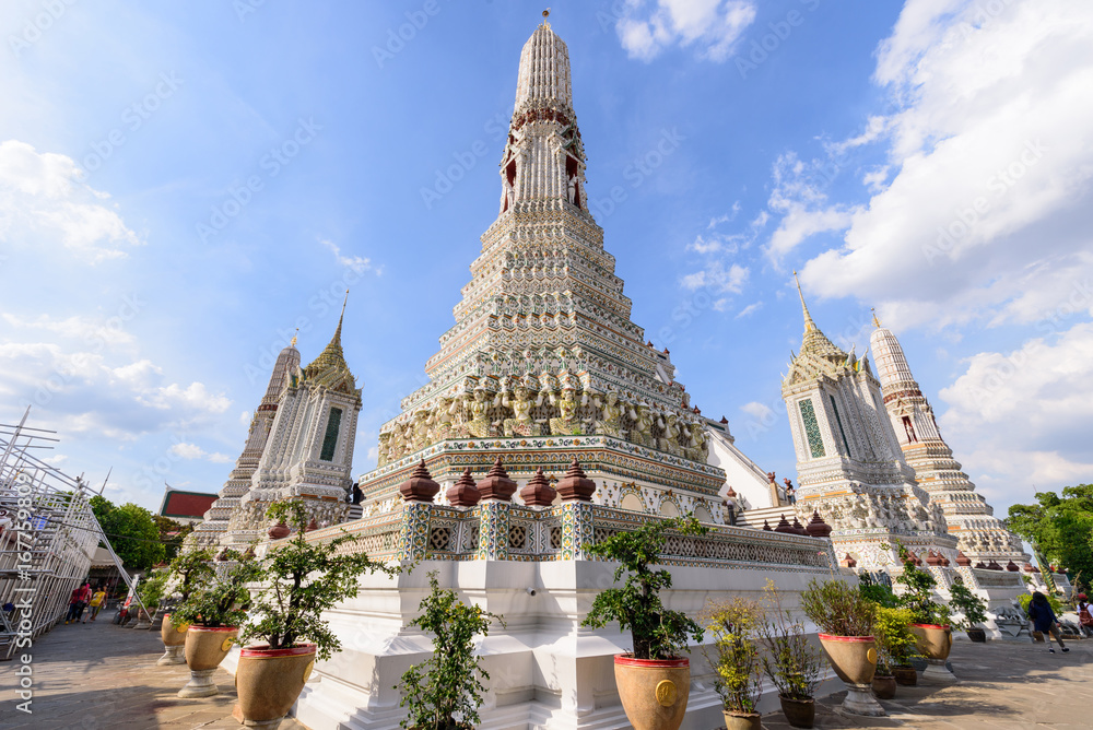 White pagoda in Wat Arun Ratchawararam Ratchawaramahawihan in Thailnd